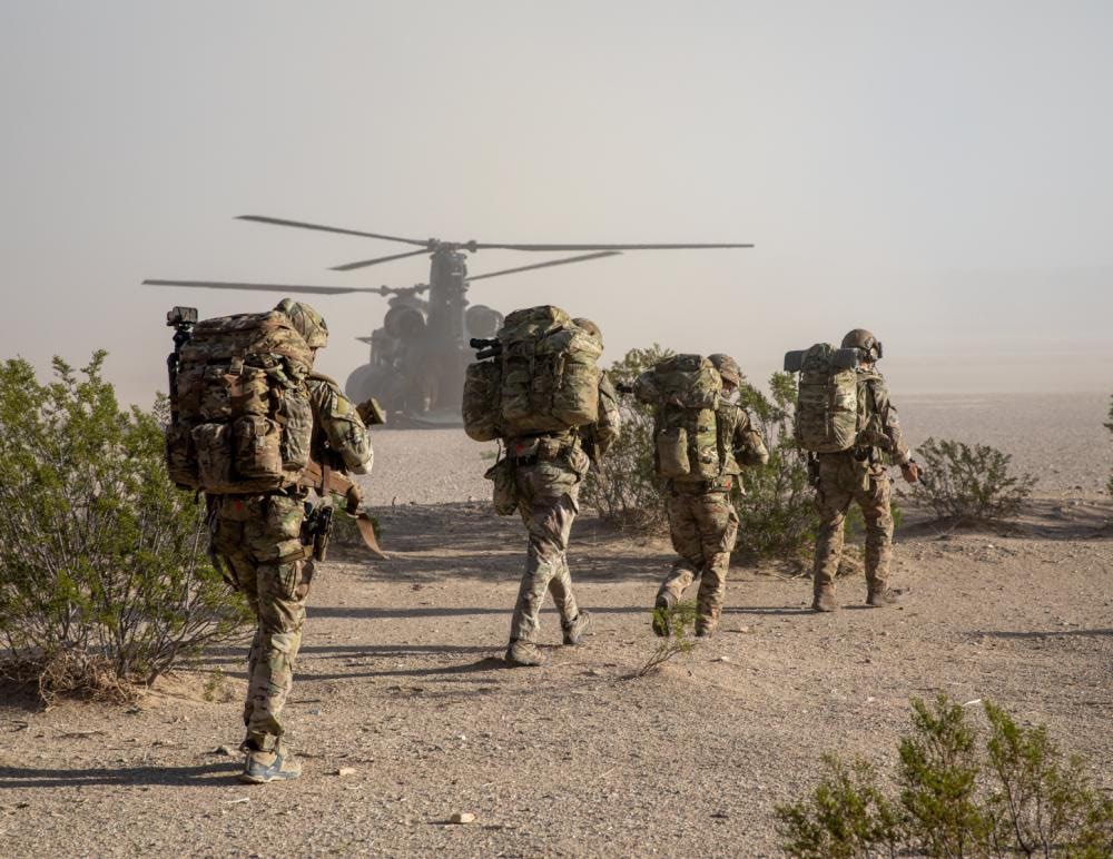 reporter covering a military mission crossword        
        <figure class=